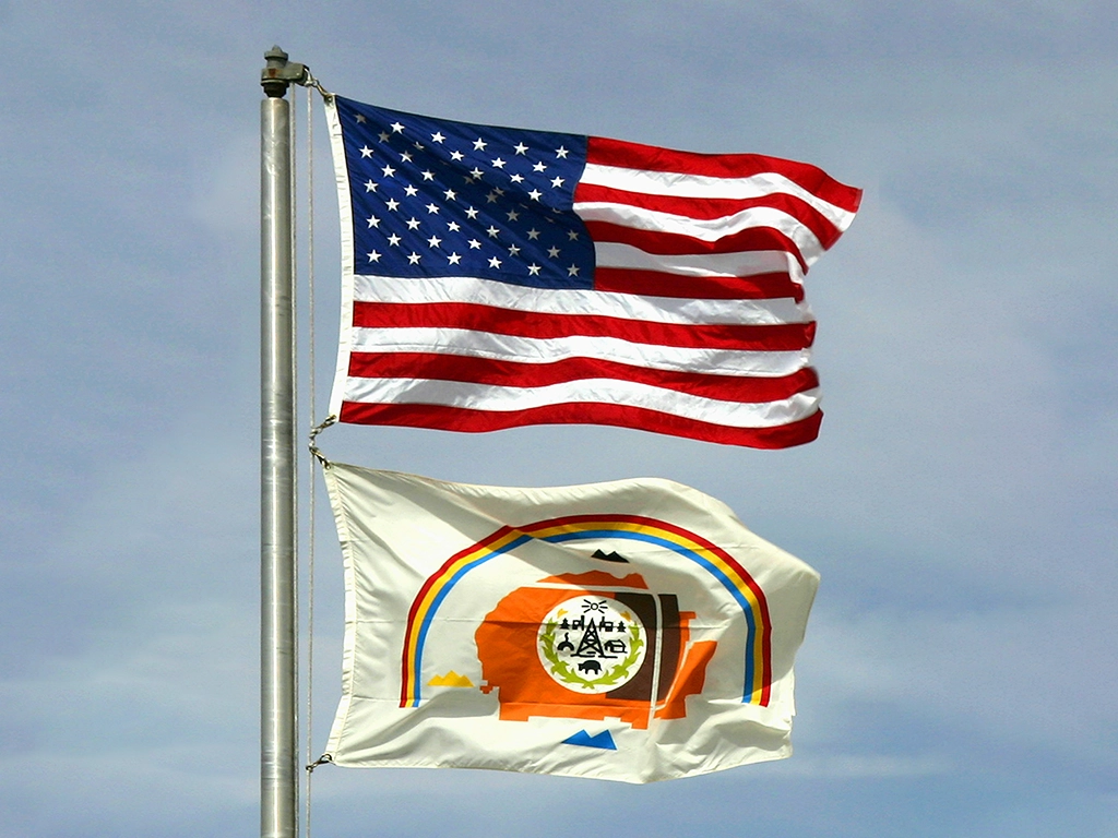 flags flying at the navajo national monument photo by paul-marshall